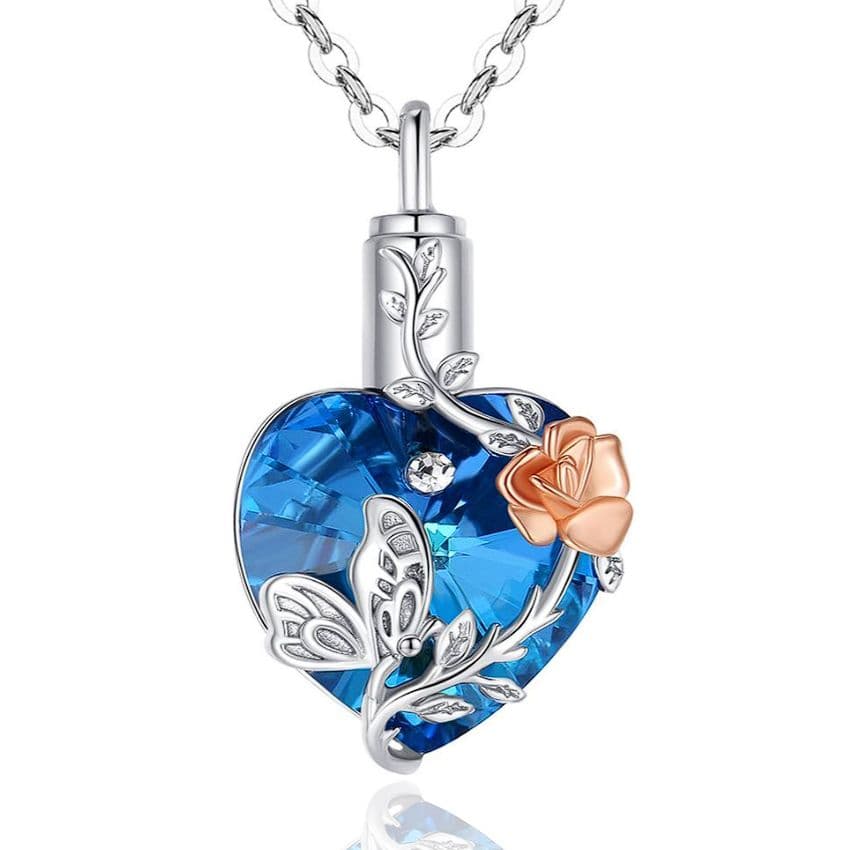 Stříbrný pietní náhrdelník - Modré Swarovski srdce s růží a motýlem - náhled 1